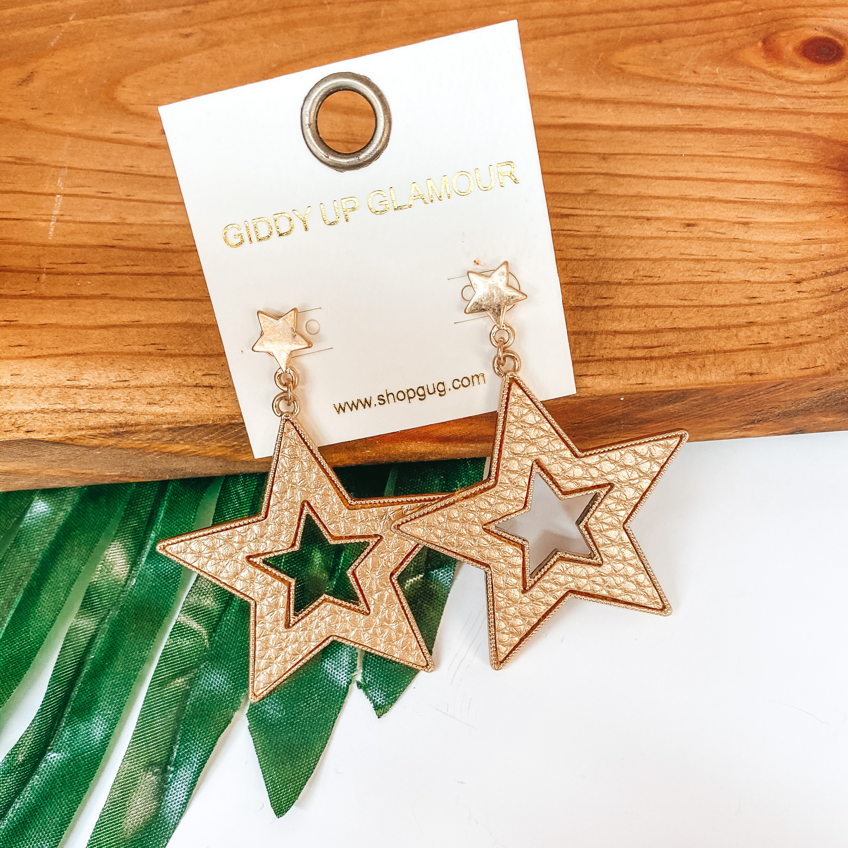 She's a Star Gold Post Dangle Earrings with Leather Star in Gold - Giddy Up Glamour Boutique