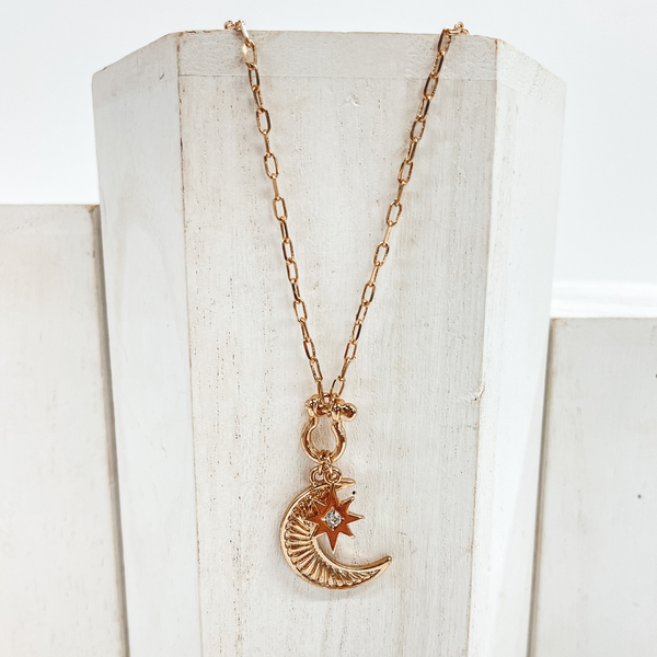 Chain Necklace with Sunburst Moon and Star Pendant in Gold