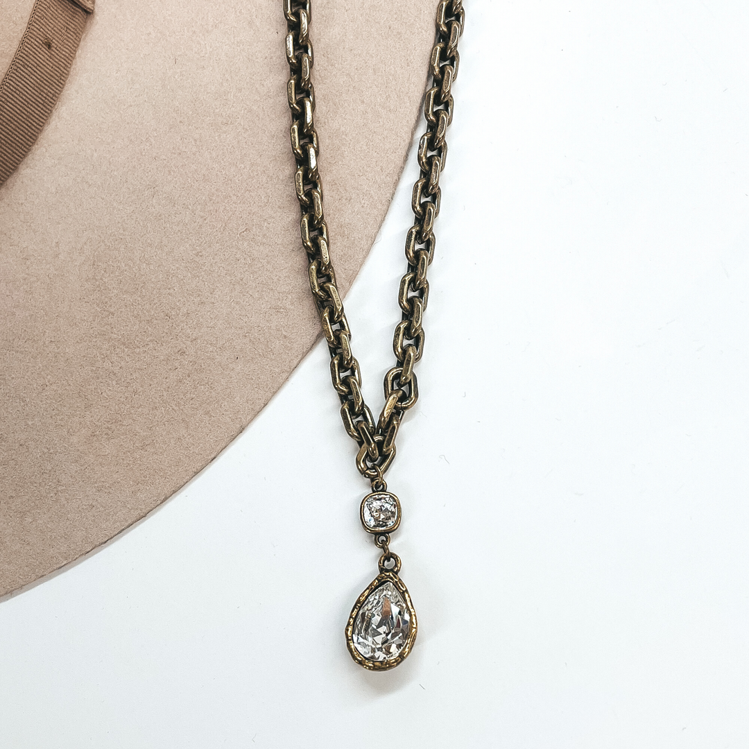 Pink Panache | Chunky Chain Necklace with Clear Crystal Teardrop and Small Clear Cushion Cut Crystal in Bronze - Giddy Up Glamour Boutique