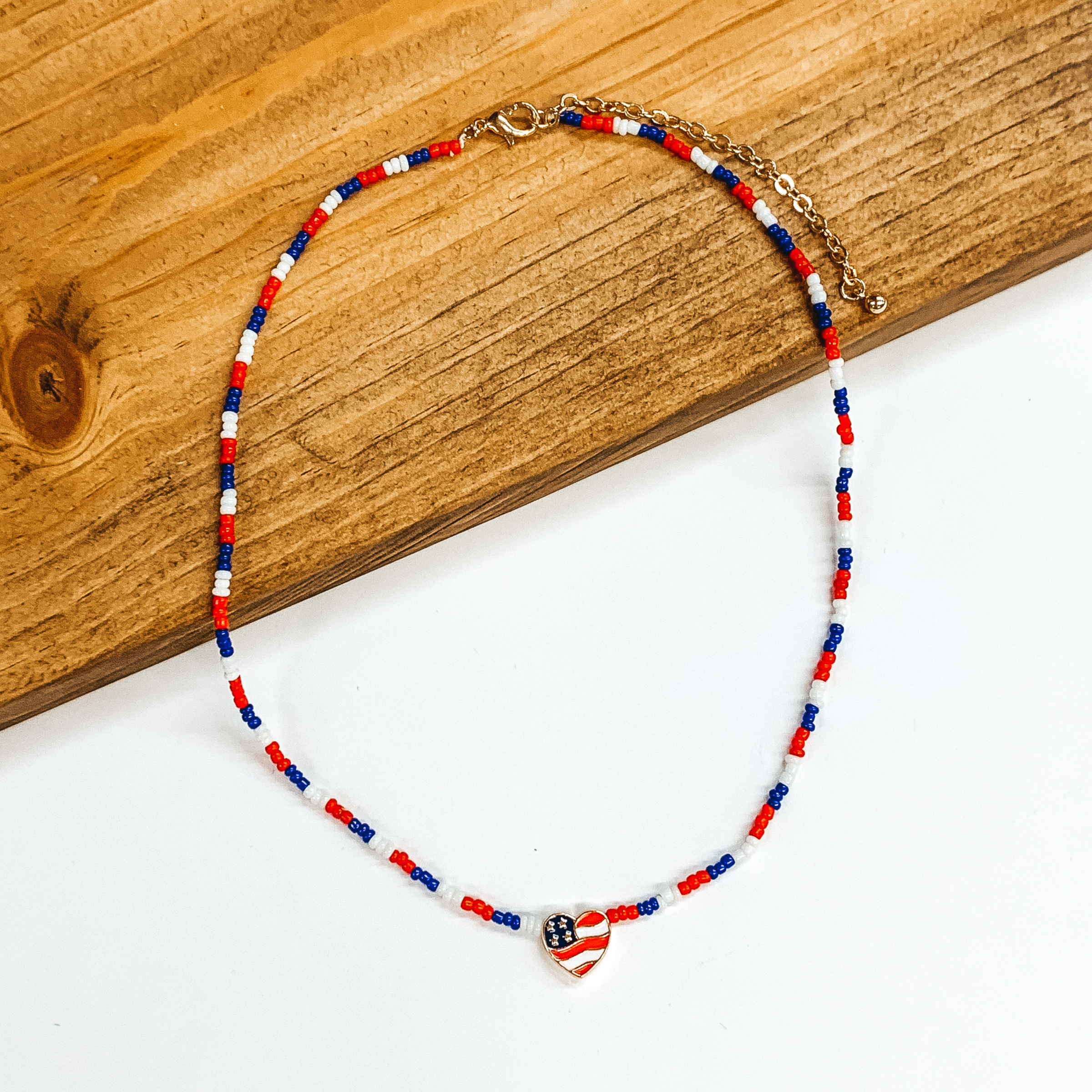 Beaded Necklace in White, Blue, Red with Heart Flag Charm - Giddy Up Glamour Boutique