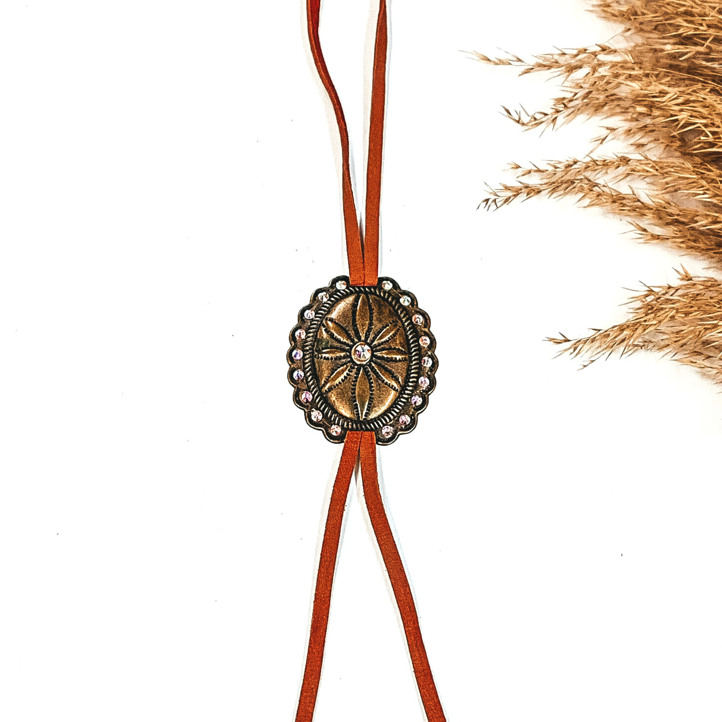 Pink Panache | Brown Faux Leather Bolo with Bronze Concho and AB Crystals - Giddy Up Glamour Boutique