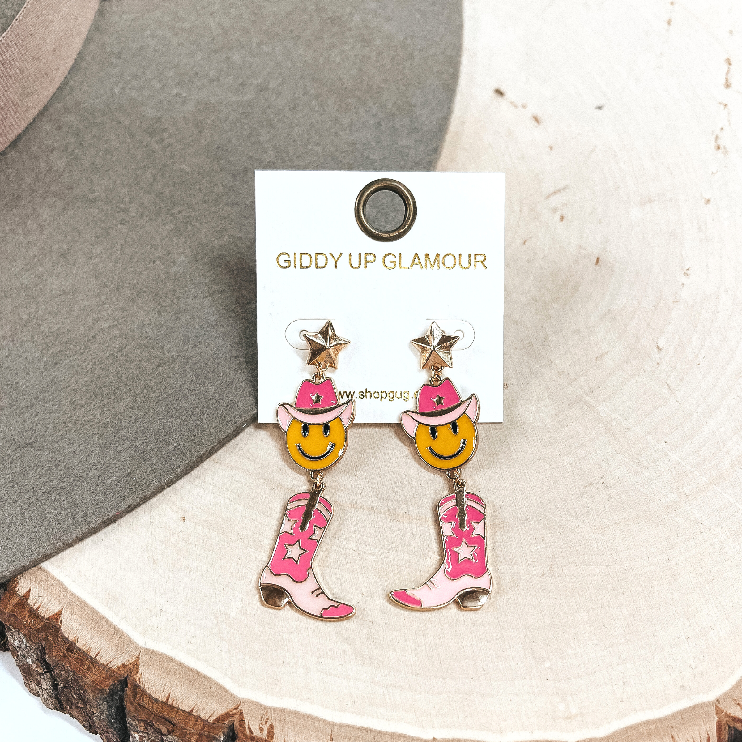 On The Fly Gold Tone Star Post Earrings with Happy Face Cowboy and Boot Pendant Earrings in Pink - Giddy Up Glamour Boutique