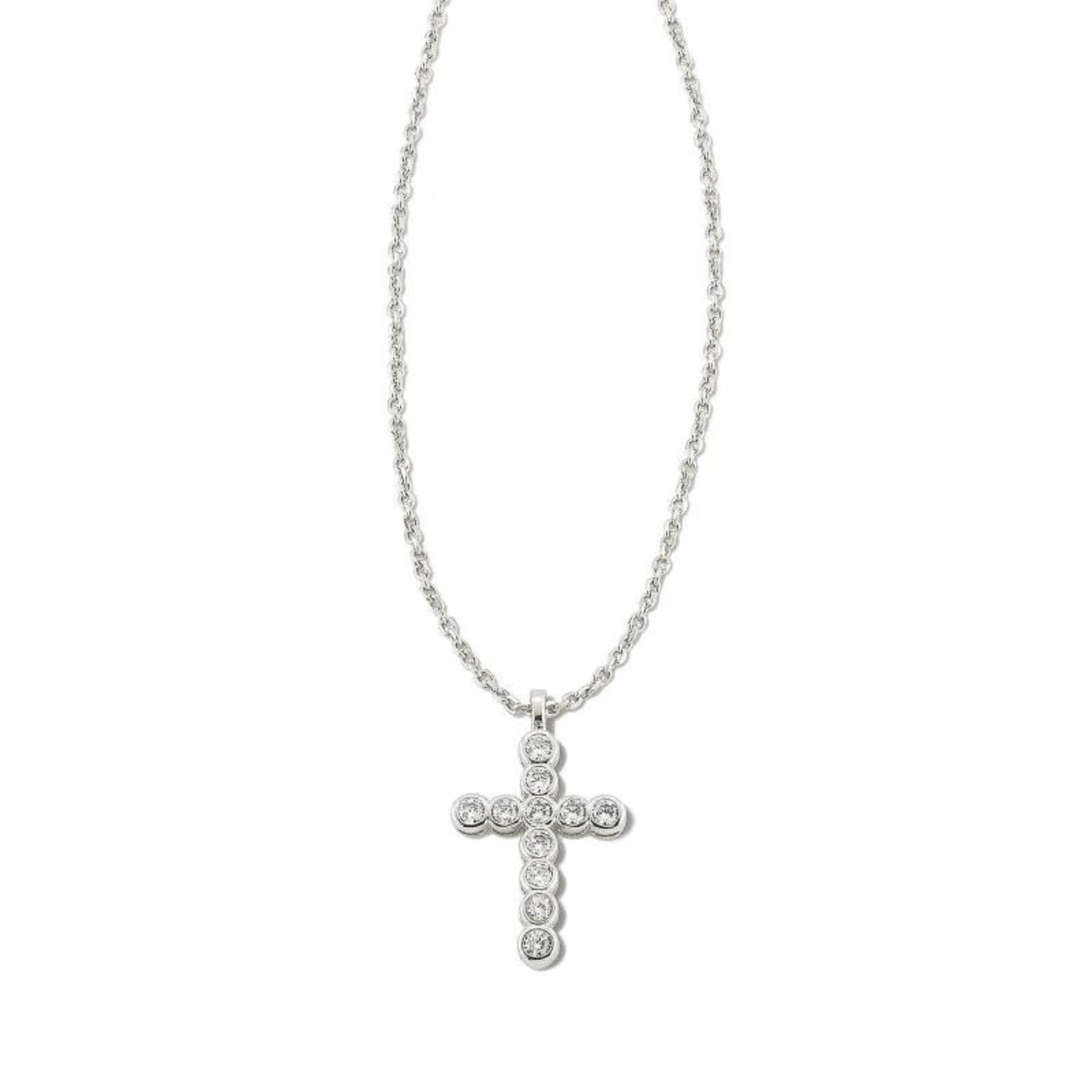Silver necklace with white crystal cross pendant, pictured on a white background.