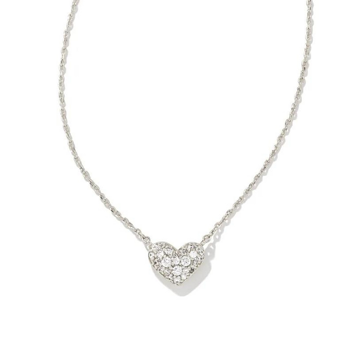Silver crystal heart necklace pictured on a white bacground.