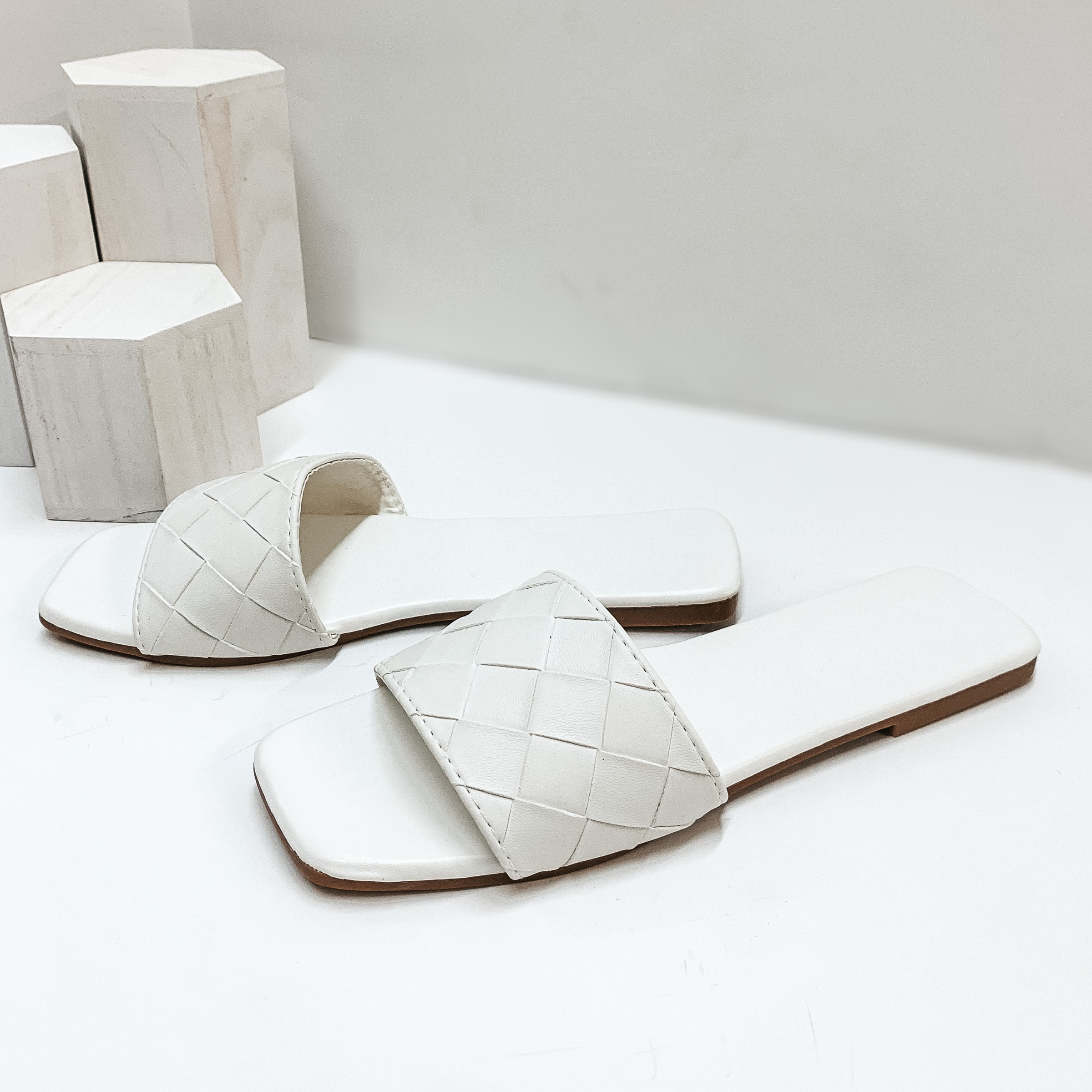 Always Looking Up Basket Weave One Strap Slide On Sandals in White - Giddy Up Glamour Boutique