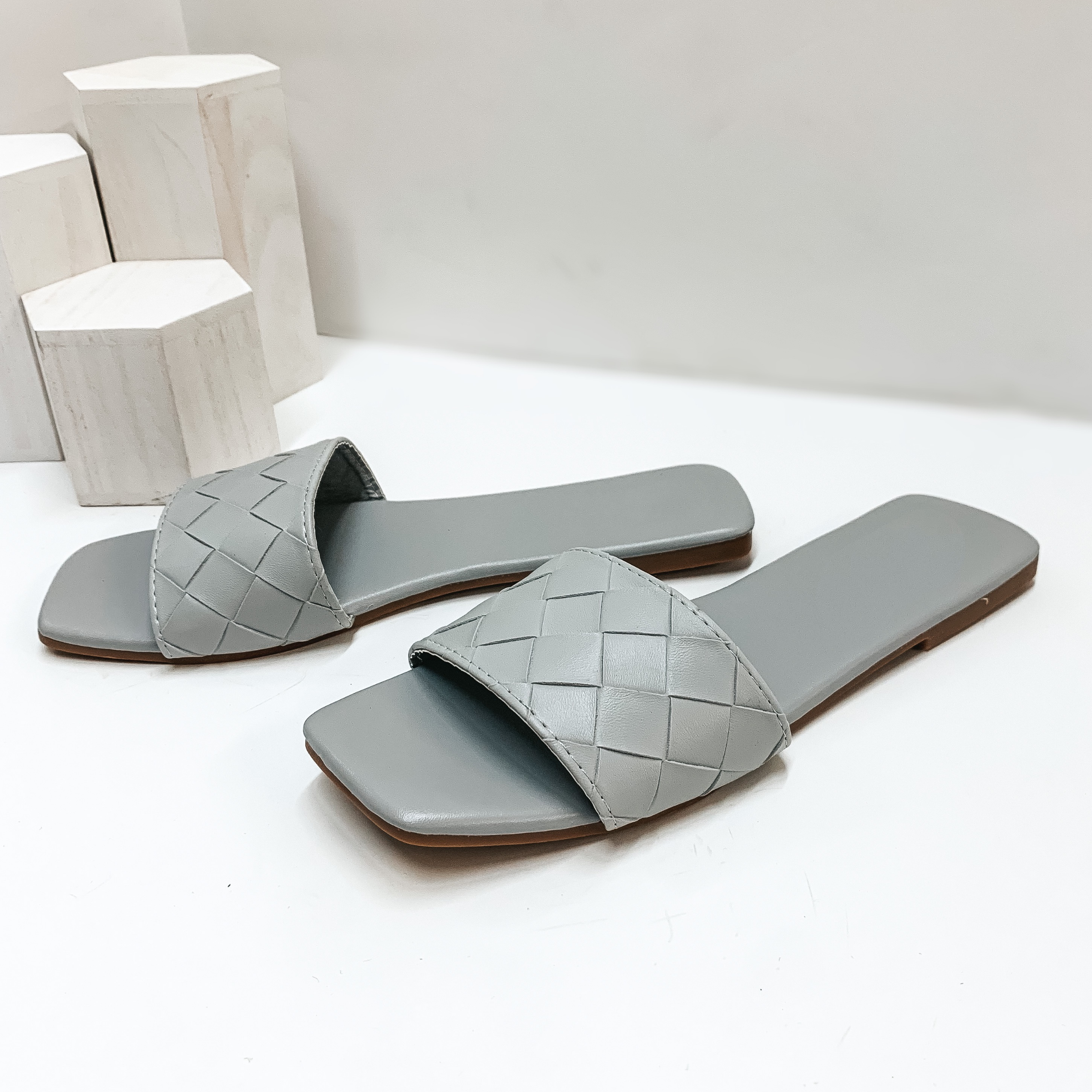 Always Looking Up Basket Weave One Strap Slide On Sandals in Grey - Giddy Up Glamour Boutique