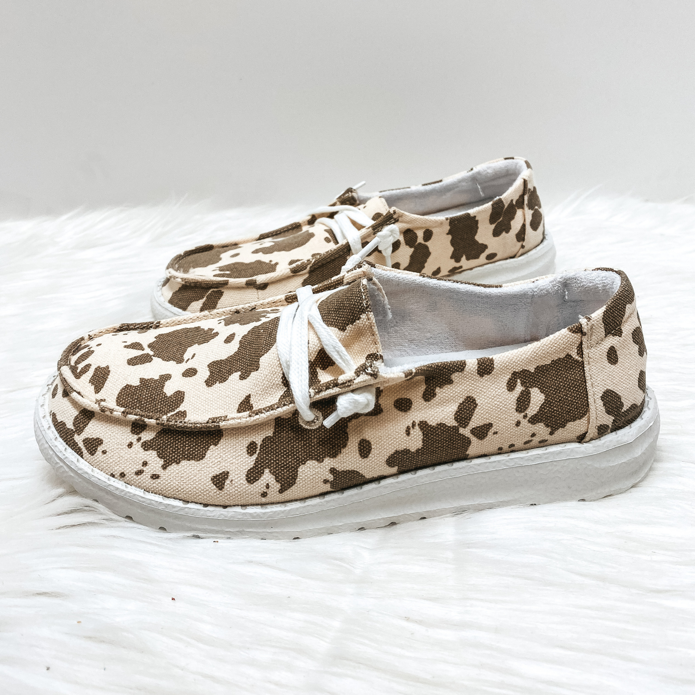 Very G | Have To Run Cow Print Slip On Loafers with Laces in Tan - Giddy Up Glamour Boutique