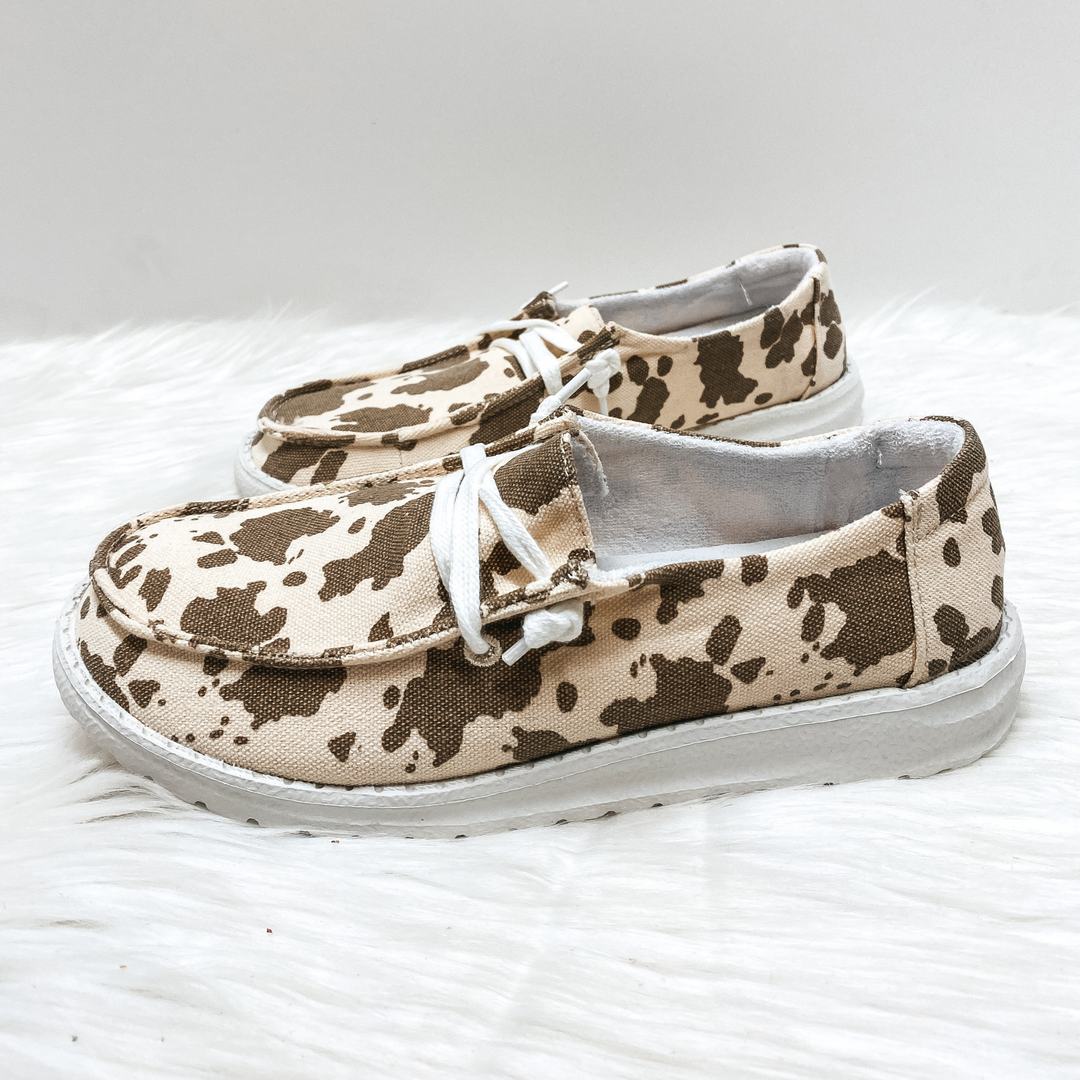 Very G | Have To Run Cow Print Slip On Loafers with Laces in Tan - Giddy Up Glamour Boutique