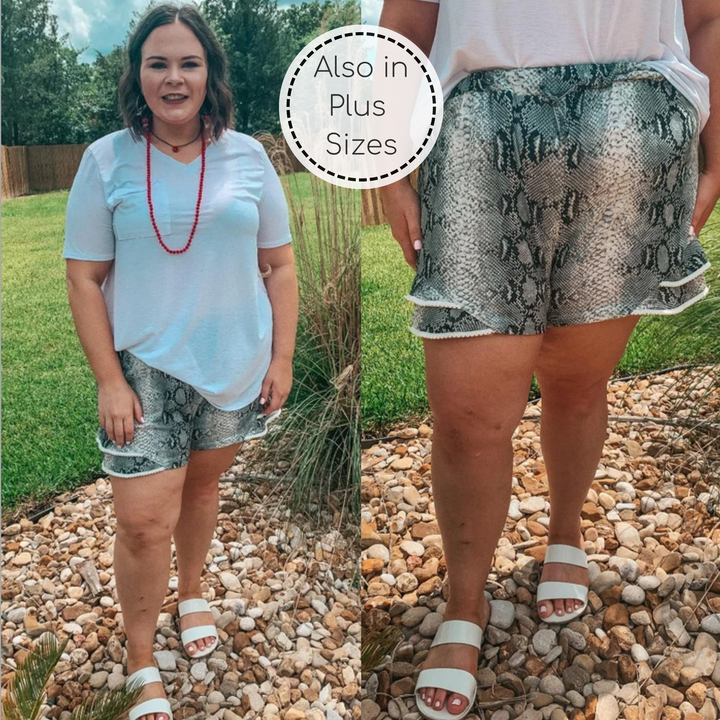 Making Hissstory Ruffle Hem Shorts with Pom Pom Trim in Snakeskin - Giddy Up Glamour Boutique