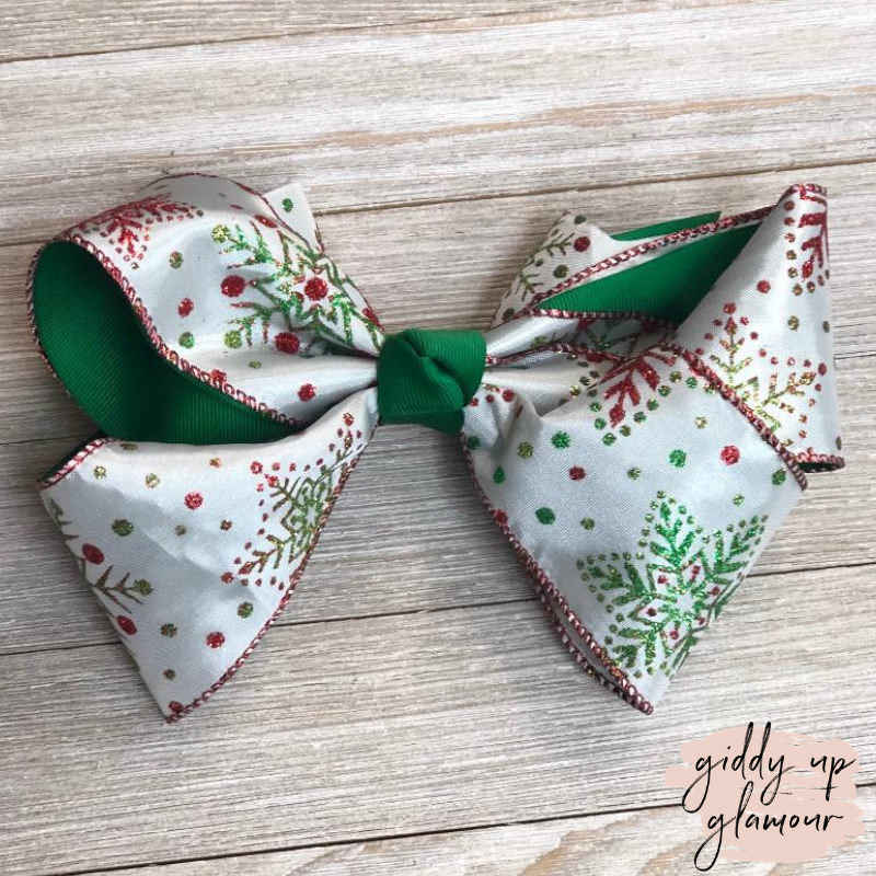 White Snowflake Hair Bow with Glitter and Green Accents - Giddy Up Glamour Boutique