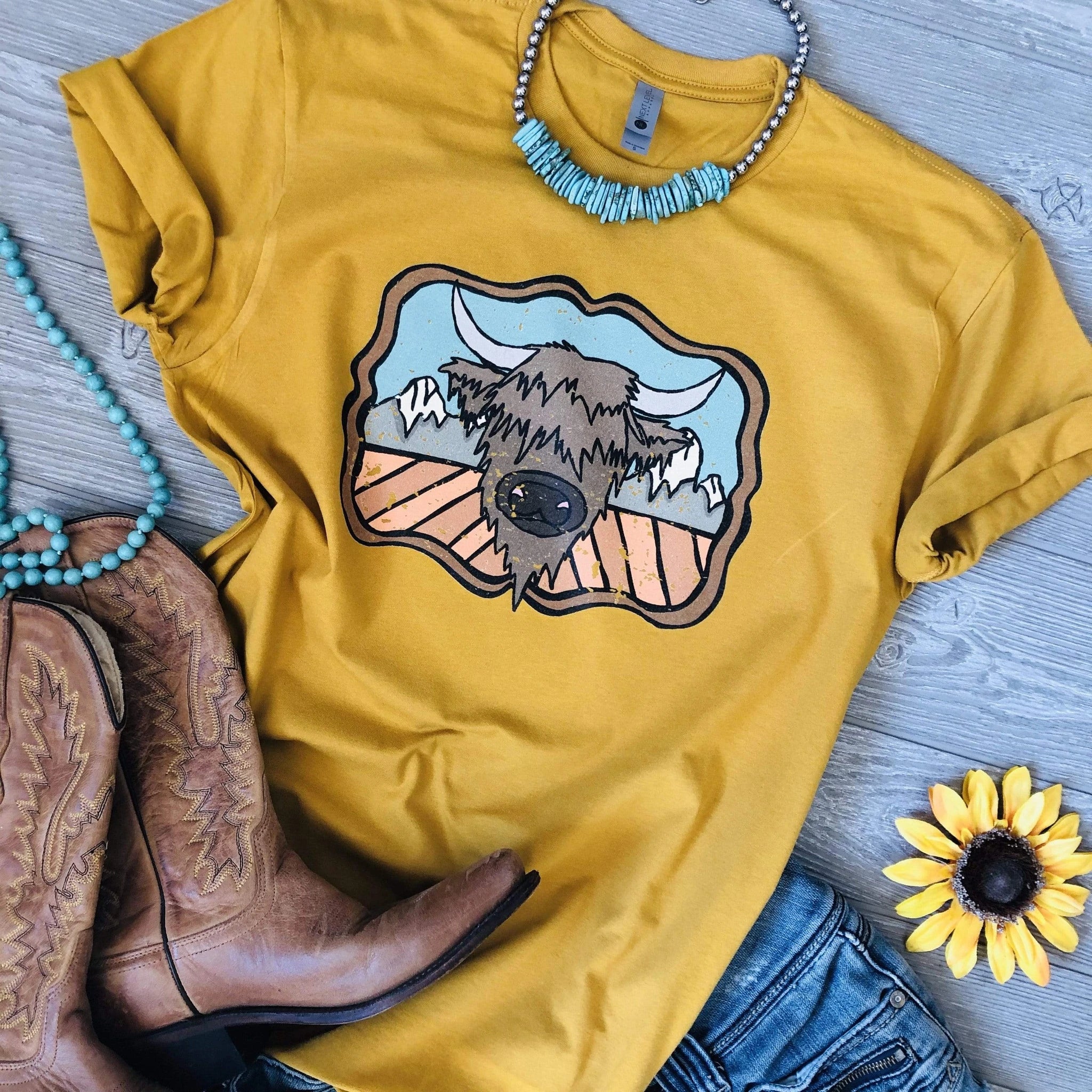 Online Exclusive | Highland Cow and the Mountains Short Sleeve Graphic Tee in Mustard Yellow - Giddy Up Glamour Boutique