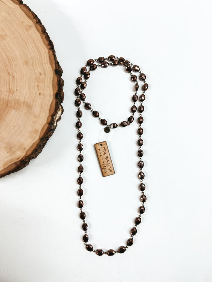 Pink Panache | Long Chocolate Flat Oval Crystal Beaded Necklace with Bronze Links - Giddy Up Glamour Boutique