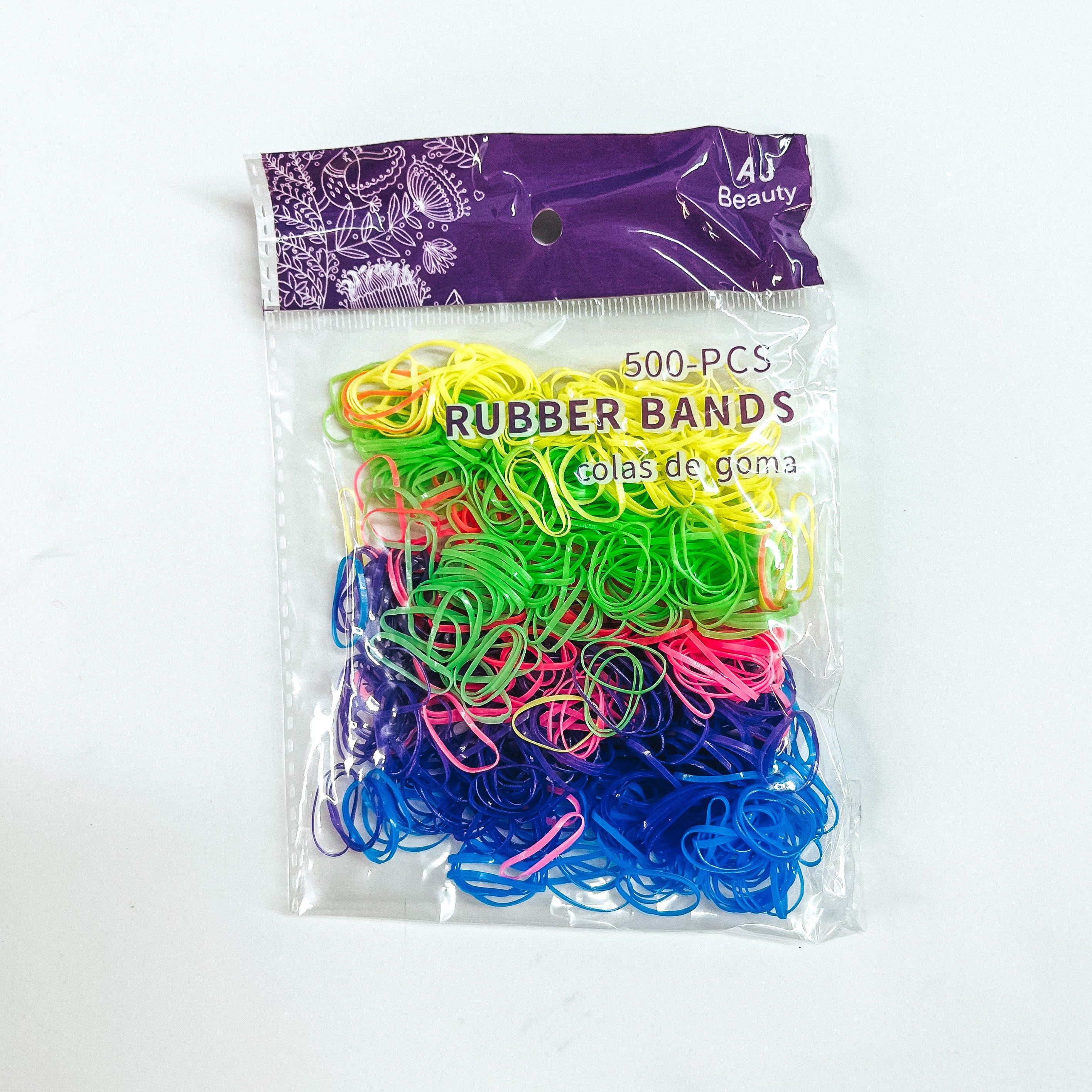 This is a pack of 500 small rubber bands in different colors such as neon yellow,  neon green, pink, dark blue and blue. This clear and purple pack is taken on a white background.