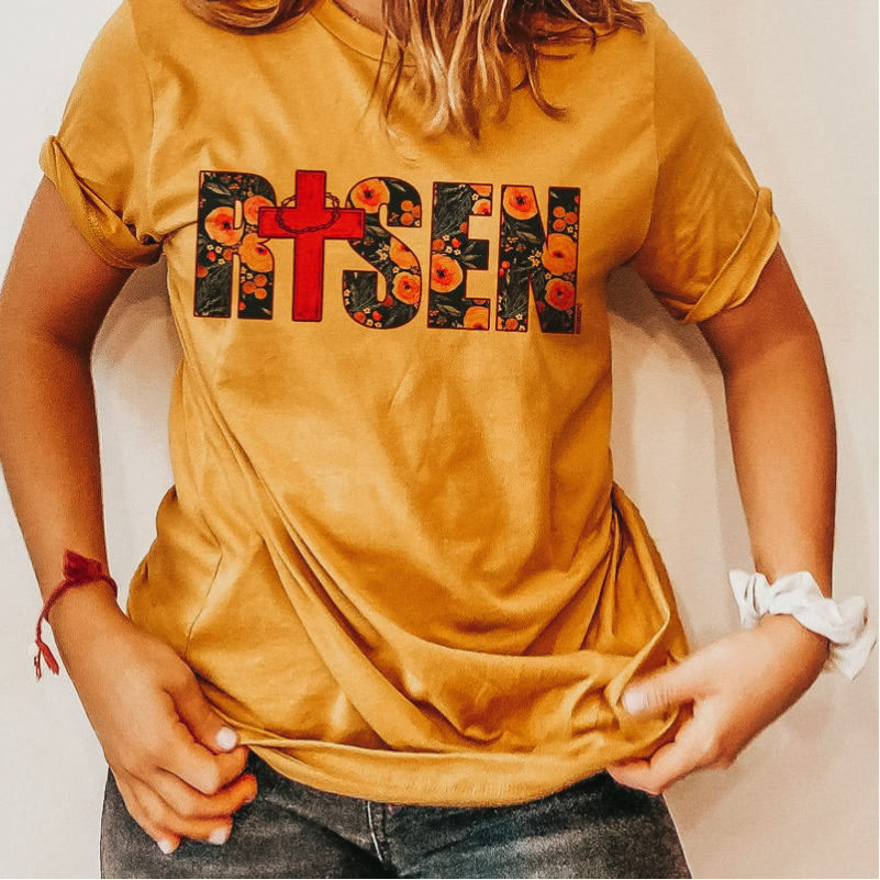 Online Exclusive | Risen with Cross Short Sleeve Graphic Tee in Mustard Yellow - Giddy Up Glamour Boutique