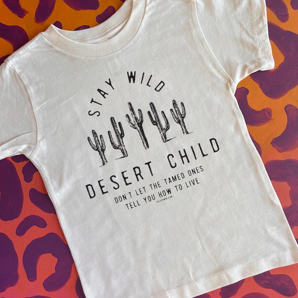 Online Exclusive | Stay Wild Desert Child with Cactus Short Sleeve Graphic Tee in Cream - Giddy Up Glamour Boutique