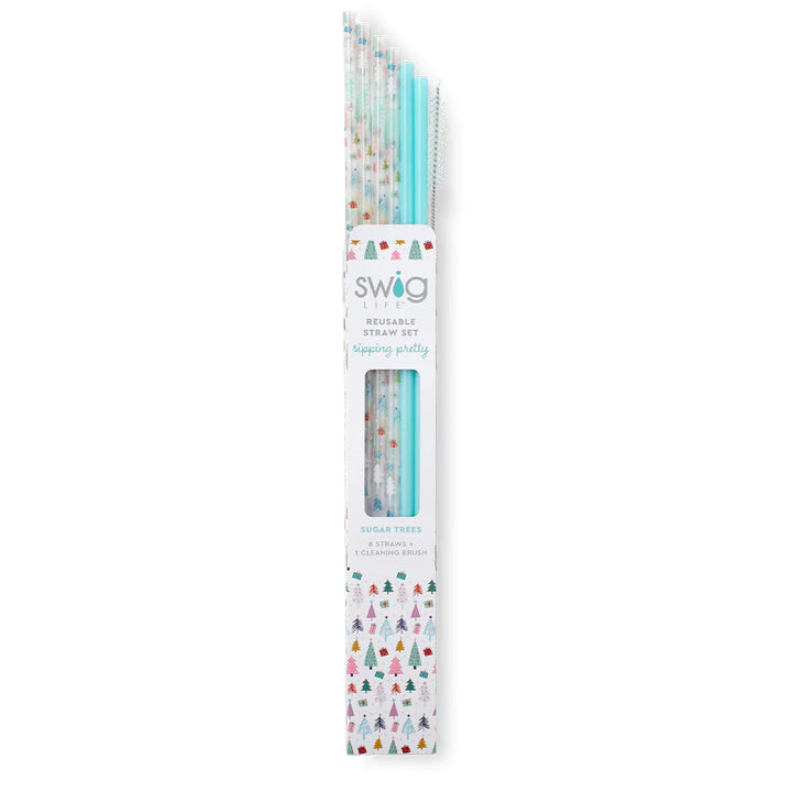 This is a pack of six straws with one cleaning brush, there are four multicolored  christmas tree print straws, and 2 turquoise. These items are taken on a white  background.